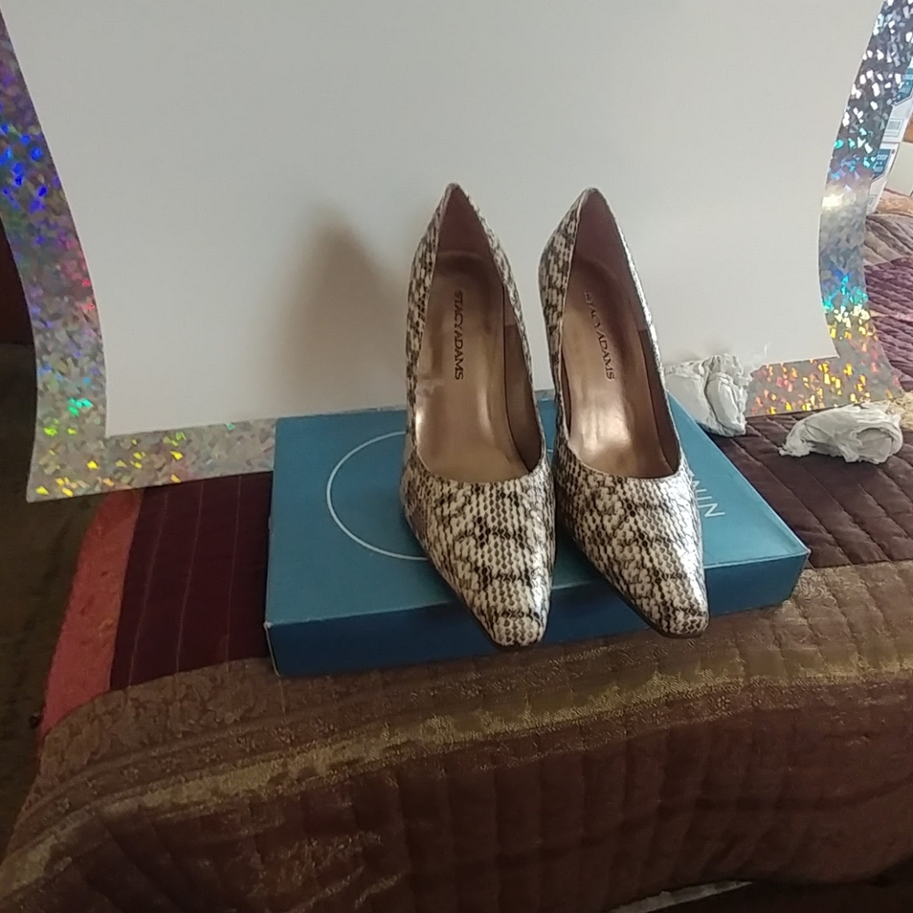 3 1/2 in. Creme multi colored heels.